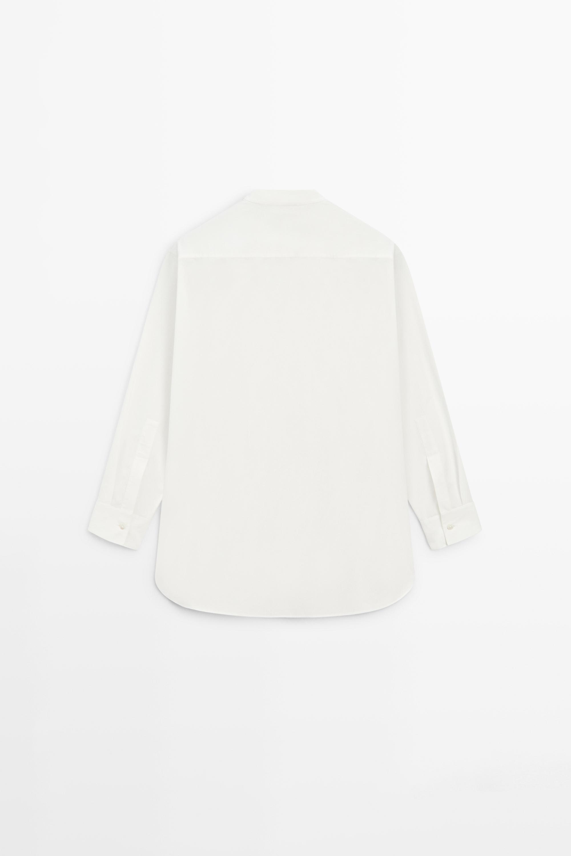 100% cotton poplin shirt with embroidered bib
